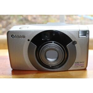 Canon SURE SHOT 105 Zoom S 35mm Film CAMERA Point and Shoot. Tested to power on.